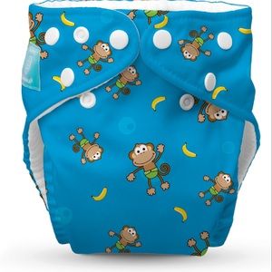 Charlie banana 6 cloth diapers + 8 inserts + extras